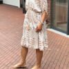 Ibiza style jurk met print beige