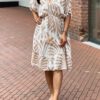 Ibiza style jurk met print beige