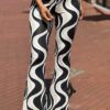 Travel Flared broek ´BY Swan´ printed zwart/beige