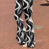 Travel Flared broek ´BY Swan´ printed zwart/beige