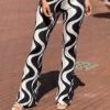 Travel Flared broek ´BY Swan´ printed zwart/beige