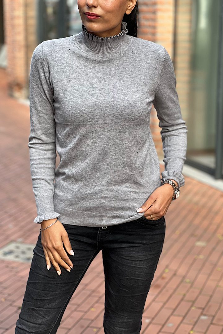 Turtleneck trui met ruches jeans